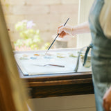 Rebecca Deneau's oil painting palette with hand-mixed colors
