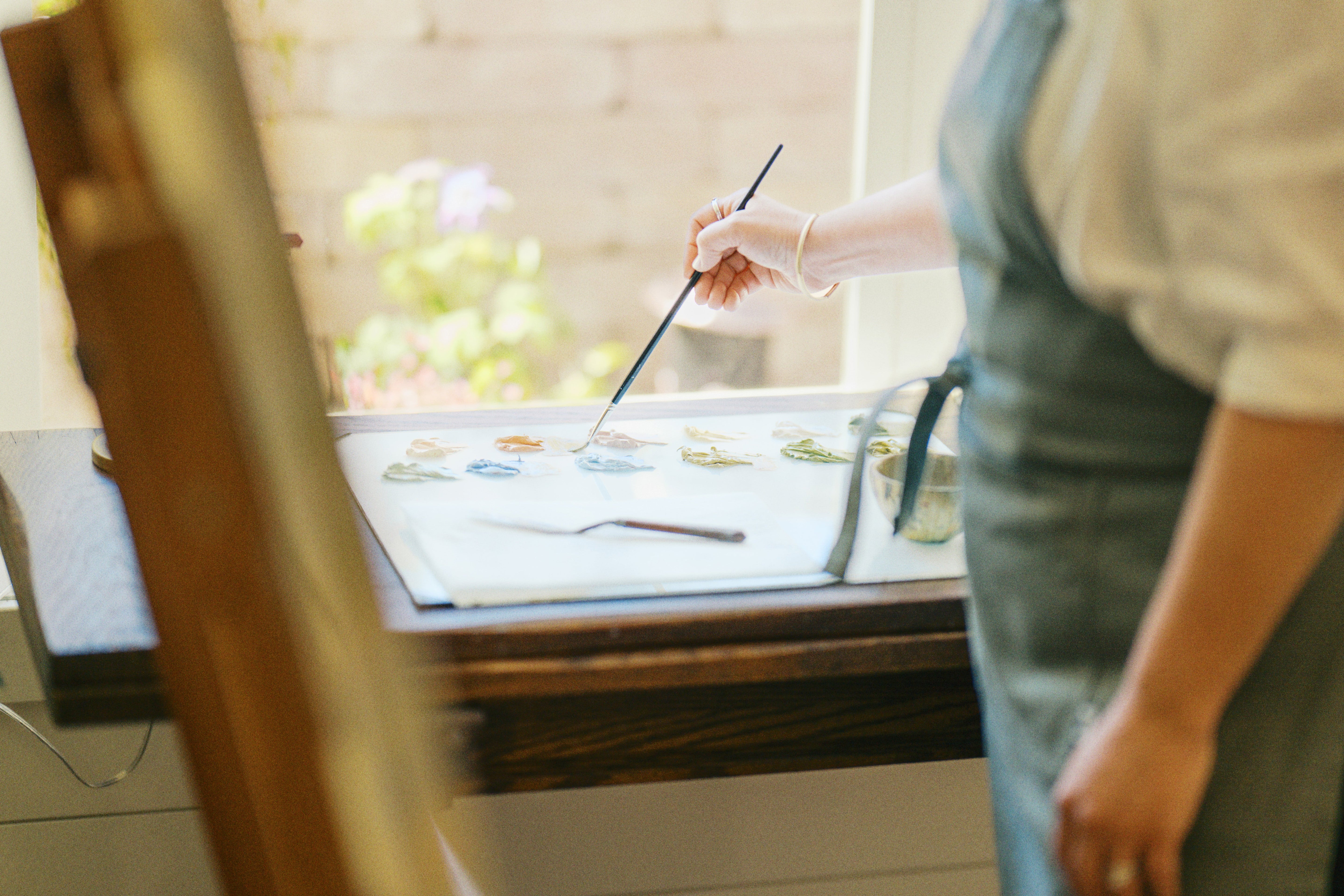 Rebecca Deneau's oil painting palette with hand-mixed colors